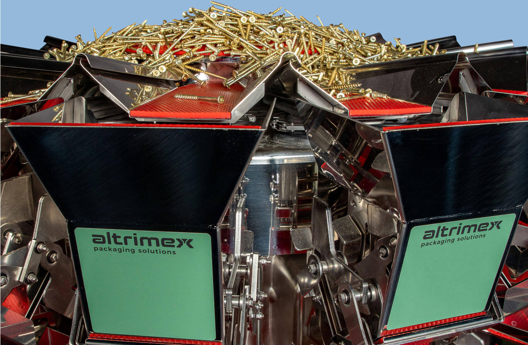 Close up of a multihead weigher with golden screws
