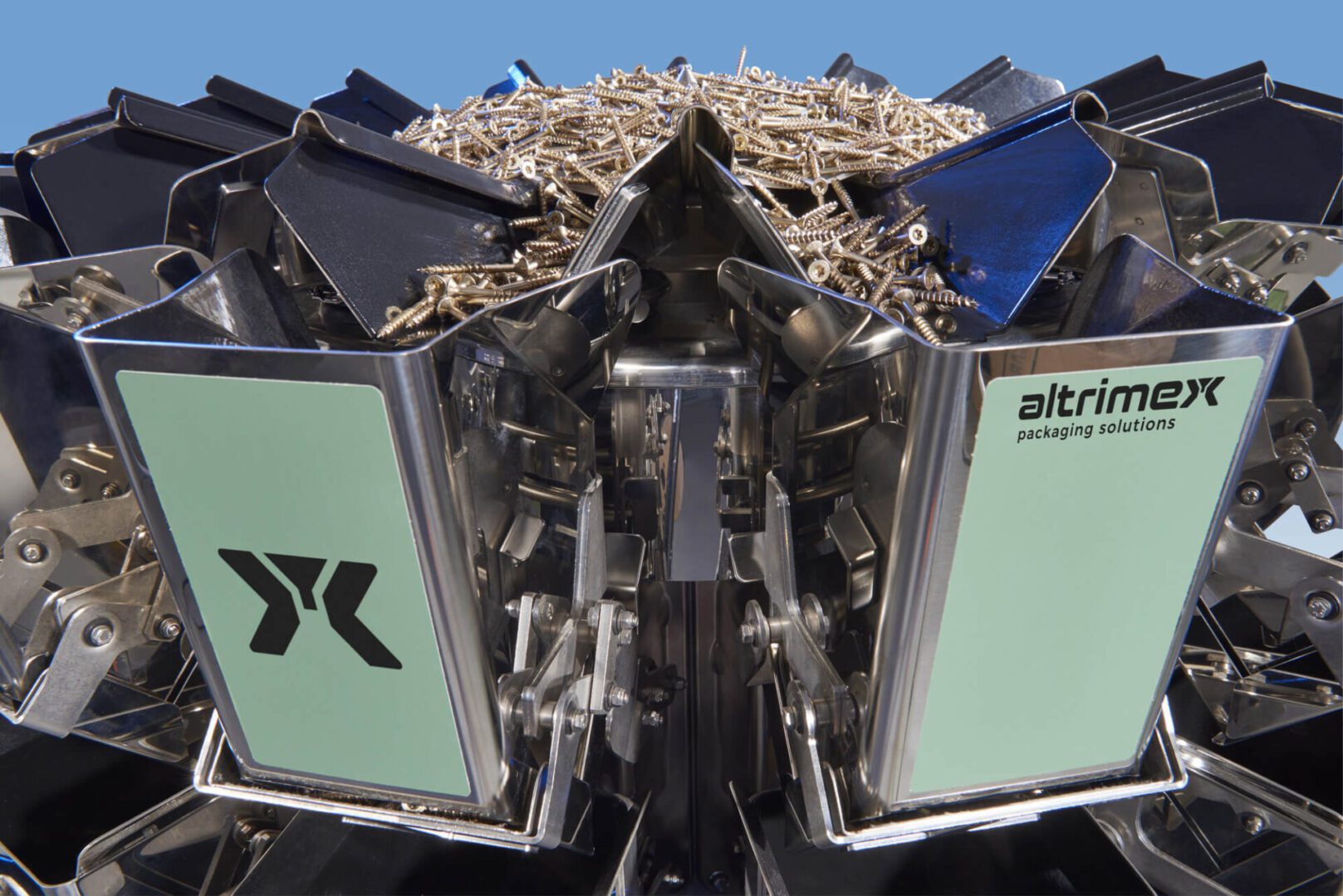 Closeup of a Multihead weigher with golden screws